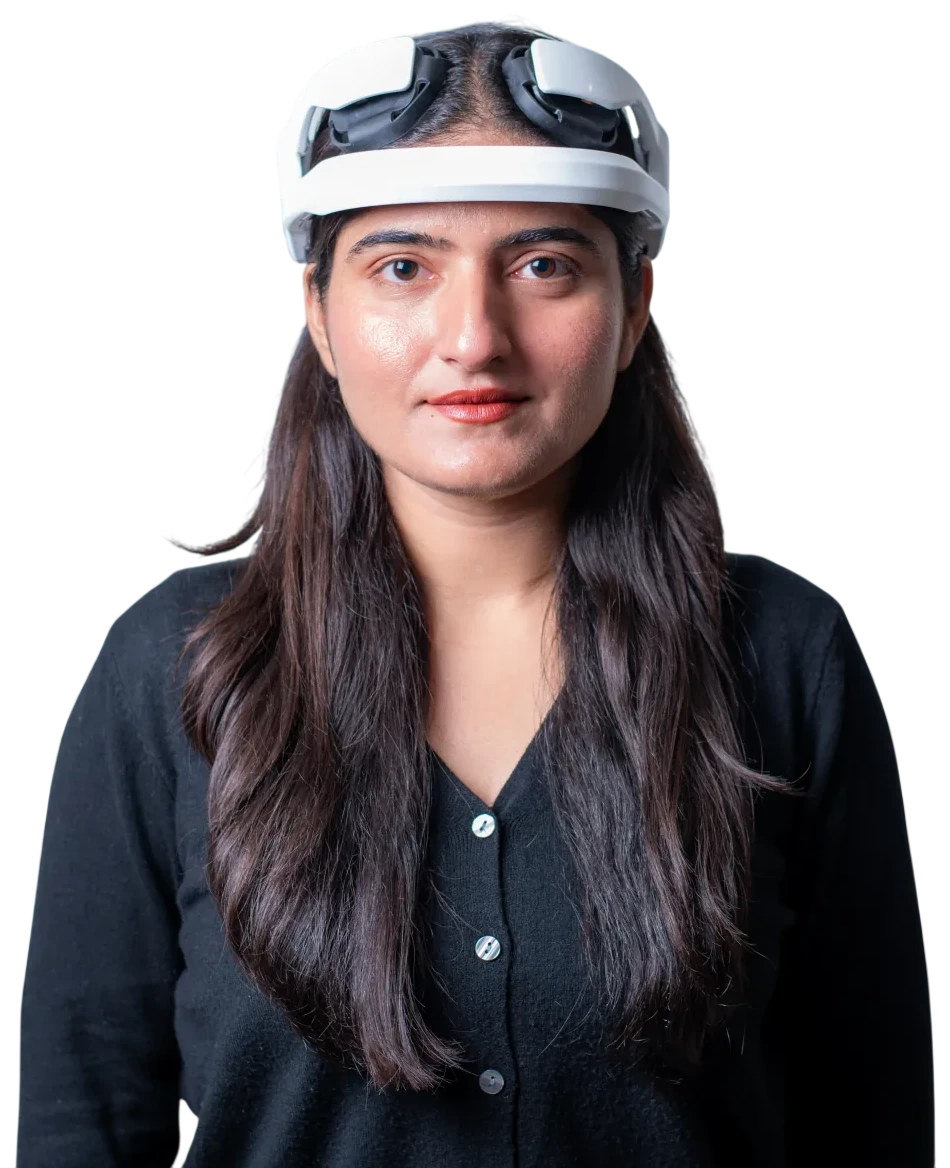 Person wearing ease neuromodulation headband for at-home brain stimulation therapy